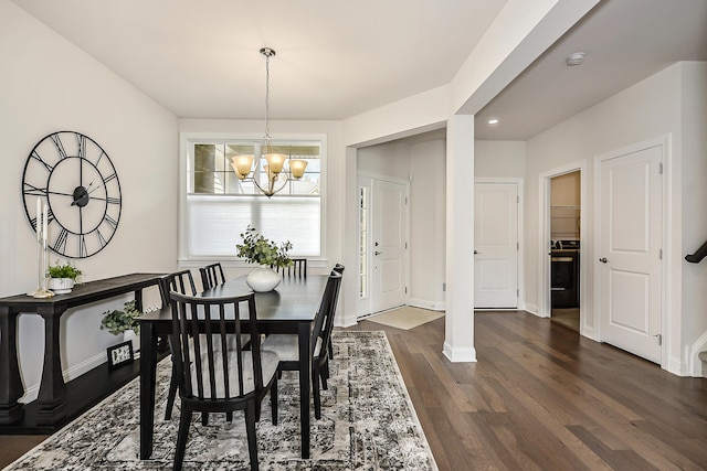 dining area featuring a chandelier, baseboards, dark wood-style floors, and recessed lighting