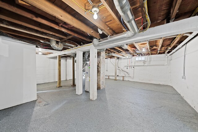 unfinished below grade area with electric water heater