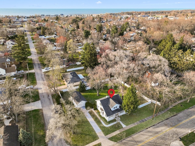 bird's eye view with a residential view and a water view