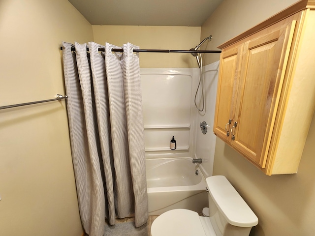 6039 W Morris Lake Rd, Mears, MI 49436 - bathroom featuring shower / tub combo with curtain and toilet