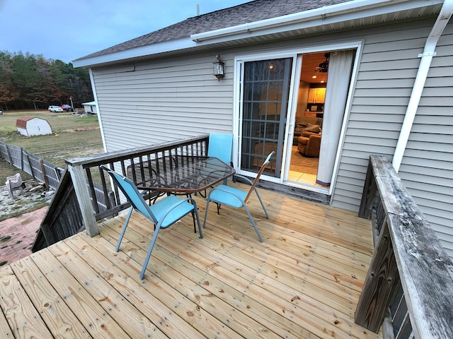6039 W Morris Lake Rd, Mears, MI 49436 - deck with outdoor dining area