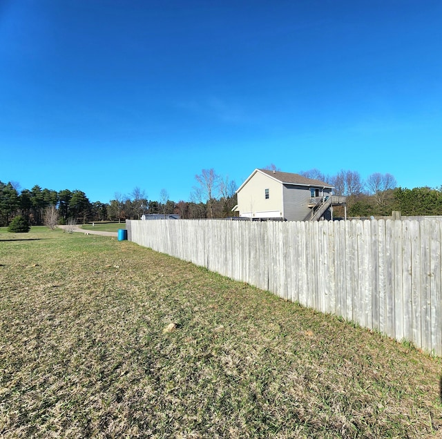 6039 W Morris Lake Rd, Mears, MI 49436 - view of yard with fence