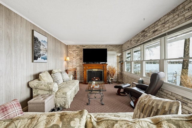 5505 Lakewood Dr, Coloma, MI 49038 - living area featuring carpet flooring and a lit fireplace
