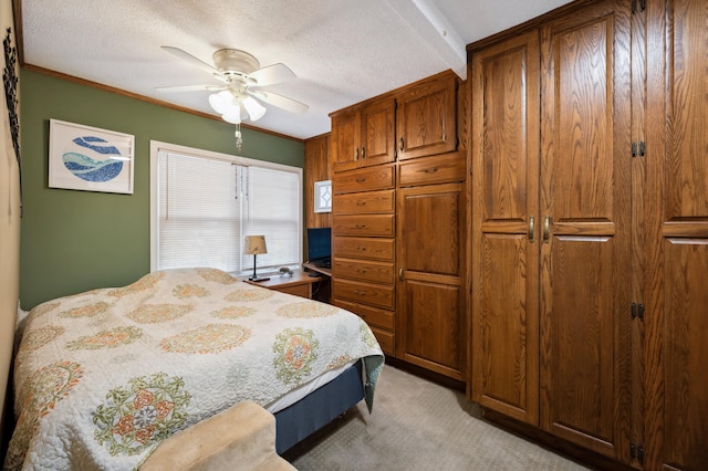 5505 Lakewood Dr, Coloma, MI 49038 - bedroom with ornamental molding, a textured ceiling, a ceiling fan, and light carpet