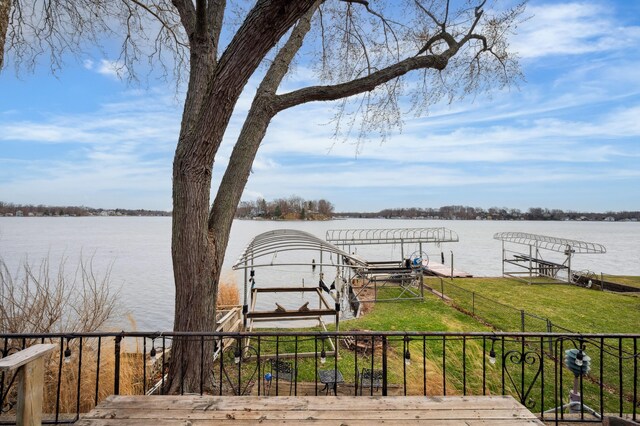 5505 Lakewood Dr, Coloma, MI 49038 - dock area featuring a yard, a water view, and boat lift