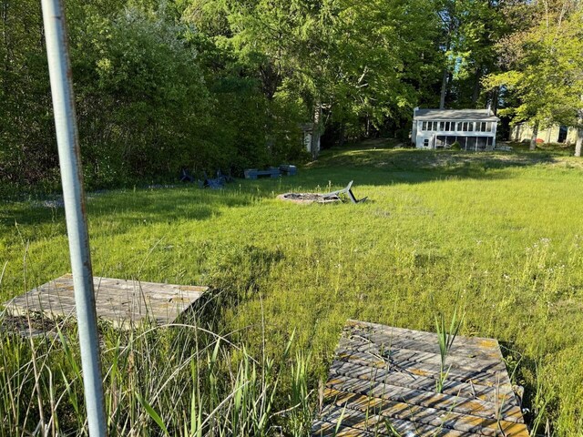 4605 Hunters Trl, Six Lakes, MI 48886 - view of yard