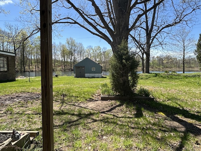 215 E Liberty Rd, Cement City, MI 49233 - view of yard featuring a water view and an outdoor structure