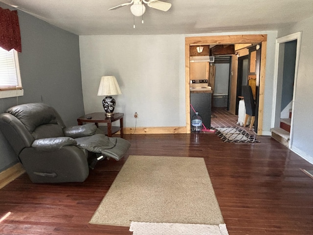 215 E Liberty Rd, Cement City, MI 49233 - living room featuring stairway, baseboards, ceiling fan, and wood finished floors