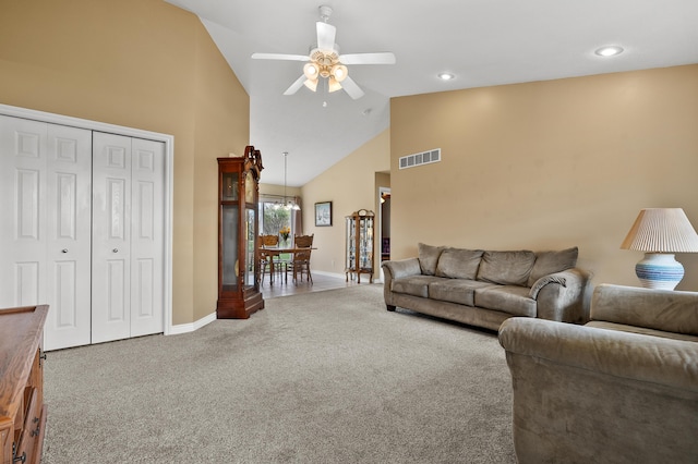 51441 Jordan St, Paw Paw, MI 49079 - carpeted living area with ceiling fan, high vaulted ceiling, a chandelier, and recessed lighting