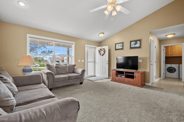 51441 Jordan St, Paw Paw, MI 49079 - living area featuring independent washer and dryer, light colored carpet, a ceiling fan, and vaulted ceiling