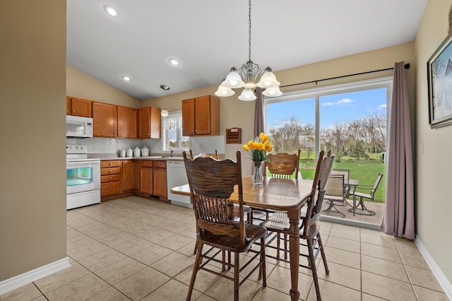 51441 Jordan St, Paw Paw, MI 49079 - dining room featuring a chandelier, light tile patterned floors, vaulted ceiling, and recessed lighting
