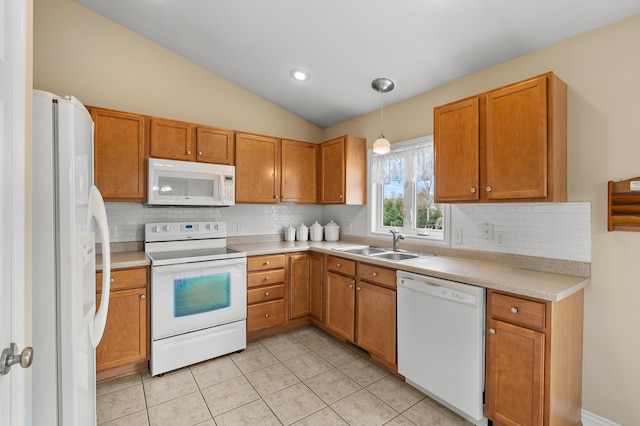 51441 Jordan St, Paw Paw, MI 49079 - kitchen with white appliances, tasteful backsplash, light countertops, light tile patterned floors, and vaulted ceiling