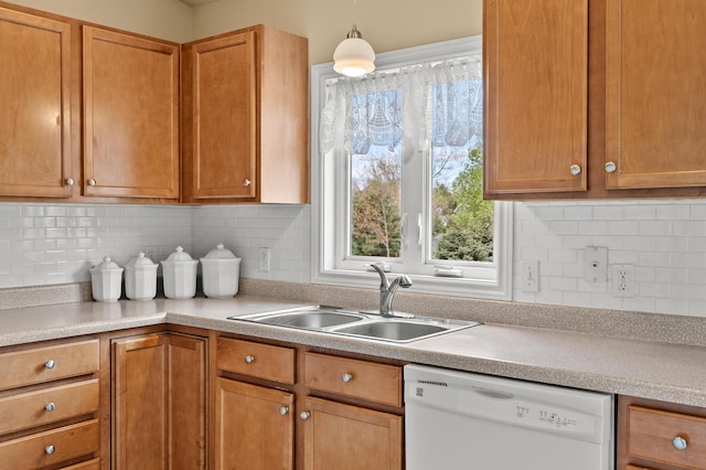 51441 Jordan St, Paw Paw, MI 49079 - kitchen with dishwasher, light countertops, and backsplash