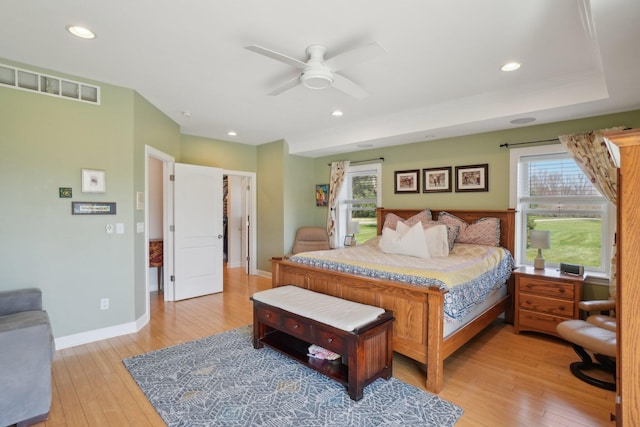 bedroom featuring recessed lighting, light wood-style floors, visible vents, and baseboards