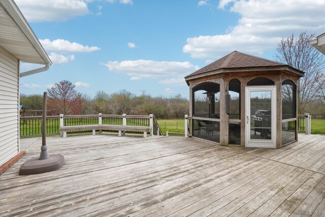 deck with a sunroom