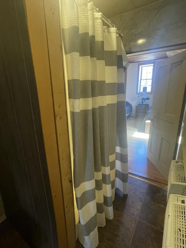 bathroom featuring a shower with curtain