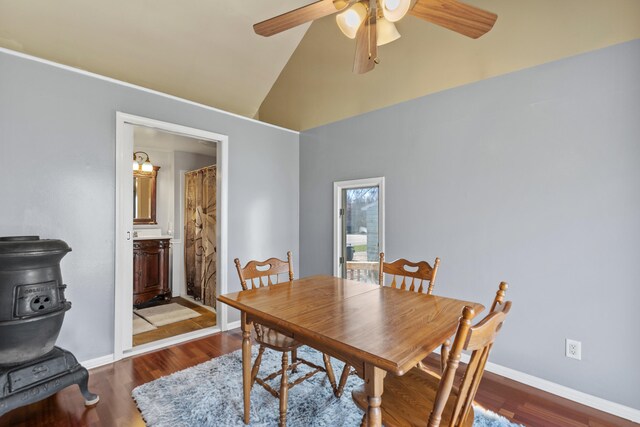 18125 174th Ave, Spring Lake, MI 49456 - dining area with baseboards, a ceiling fan, wood finished floors, and high vaulted ceiling