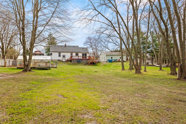 18125 174th Ave, Spring Lake, MI 49456 - view of yard featuring a deck