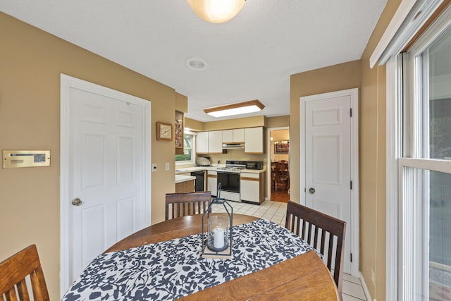 2448 Shoreham Highlands Dr, Saint Joseph, MI 49085 - dining room with light tile patterned floors