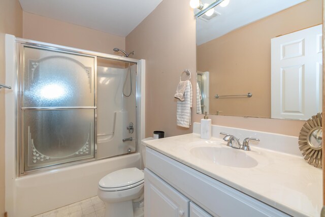 1060 Briarwood Ct, Norton Shores, MI 49441 - bathroom featuring shower / bath combination with glass door, toilet, vanity, and visible vents
