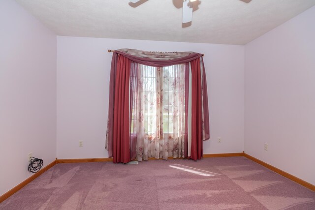 1060 Briarwood Ct, Norton Shores, MI 49441 - carpeted empty room featuring baseboards and ceiling fan