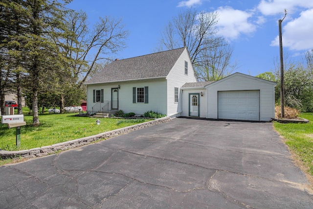 3175 Kalmbach Rd, Grass Lake, MI 49240 - view of front of property with driveway, roof with shingles, a garage, and a front lawn