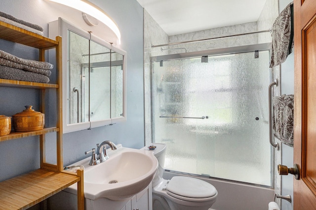 3175 Kalmbach Rd, Grass Lake, MI 49240 - full bathroom with shower / bath combination with glass door, toilet, and vanity