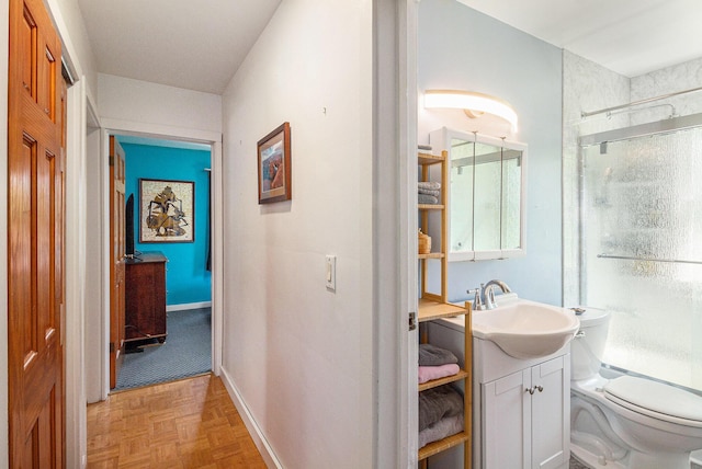 3175 Kalmbach Rd, Grass Lake, MI 49240 - bathroom featuring a shower, baseboards, vanity, and toilet