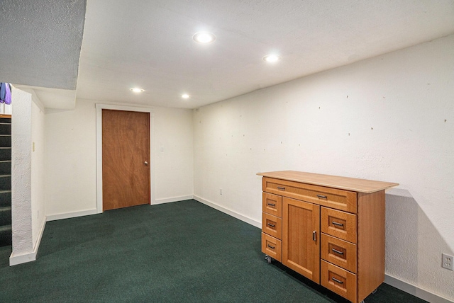 3175 Kalmbach Rd, Grass Lake, MI 49240 - finished below grade area with recessed lighting, dark carpet, baseboards, and stairway