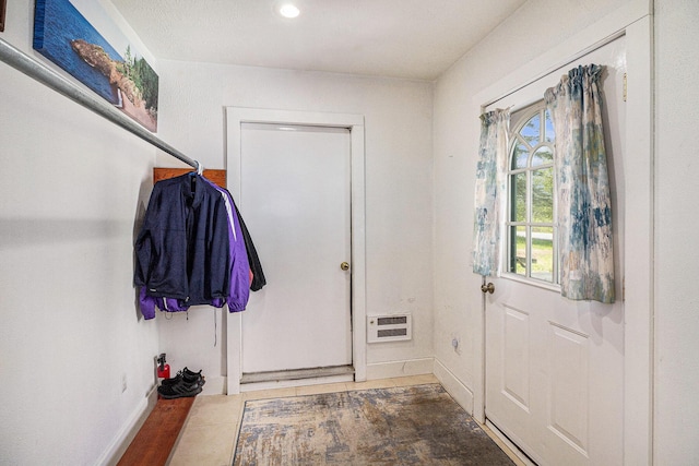 3175 Kalmbach Rd, Grass Lake, MI 49240 - entryway with baseboards, recessed lighting, and heating unit
