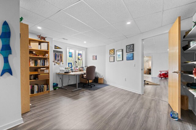 4138 W Loch Alpine Dr, Ann Arbor, MI 48103 - office space with a drop ceiling, wood finished floors, baseboards, and recessed lighting