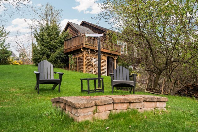4138 W Loch Alpine Dr, Ann Arbor, MI 48103 - rear view of house featuring a deck and a yard