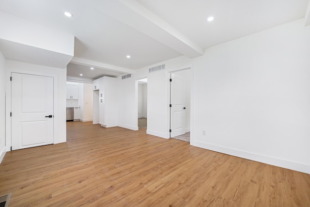 21611 Conners Ave, Warren, MI 48091 - unfurnished living room featuring recessed lighting, baseboards, visible vents, and light wood-type flooring