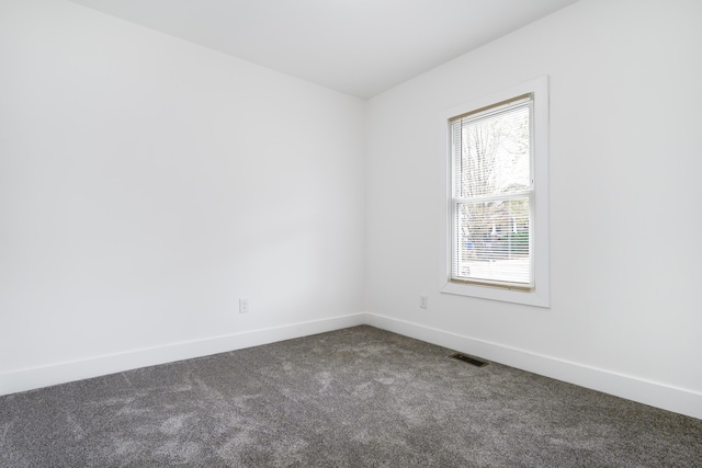 21611 Conners Ave, Warren, MI 48091 - carpeted empty room featuring baseboards, a healthy amount of sunlight, and visible vents