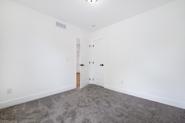 21611 Conners Ave, Warren, MI 48091 - unfurnished room featuring carpet flooring, baseboards, and visible vents
