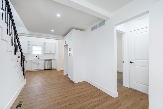 21611 Conners Ave, Warren, MI 48091 - interior space with a sink, light wood-style flooring, recessed lighting, visible vents, and stairway