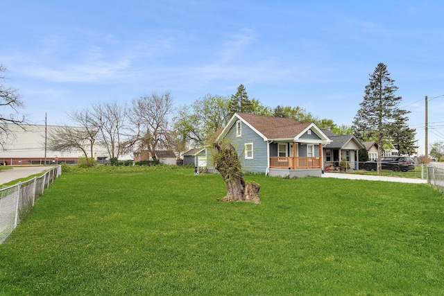 21611 Conners Ave, Warren, MI 48091 - exterior space with fence, covered porch, and concrete driveway