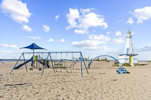 community jungle gym featuring a water view