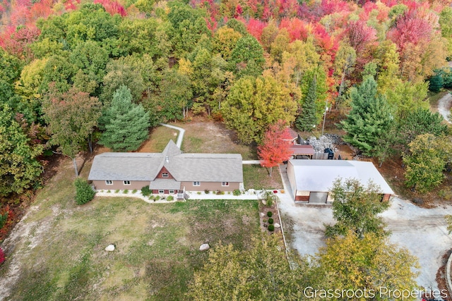 bird's eye view featuring a view of trees