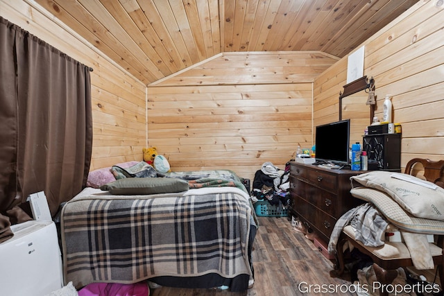 bedroom featuring wooden ceiling, wooden walls, vaulted ceiling, and dark wood finished floors