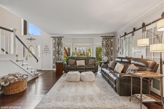 1888 Boardwalk, Saint Joseph, MI 49085 - living room featuring dark wood-type flooring, baseboards, stairs, and ornamental molding