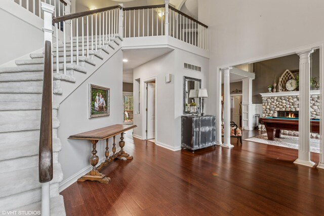 1888 Boardwalk, Saint Joseph, MI 49085 - foyer with wood-type flooring, visible vents, baseboards, and decorative columns