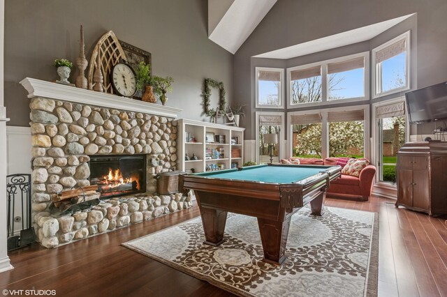 1888 Boardwalk, Saint Joseph, MI 49085 - game room featuring a stone fireplace, pool table, high vaulted ceiling, and hardwood / wood-style flooring