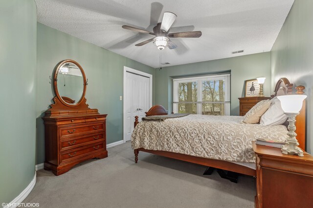 1888 Boardwalk, Saint Joseph, MI 49085 - bedroom with baseboards, visible vents, carpet floors, and a closet