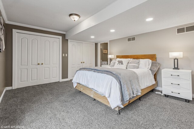 1888 Boardwalk, Saint Joseph, MI 49085 - carpeted bedroom with baseboards, multiple closets, visible vents, and recessed lighting