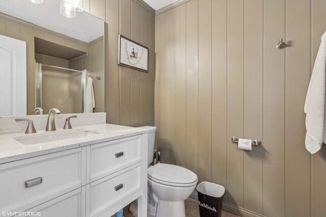1888 Boardwalk, Saint Joseph, MI 49085 - bathroom featuring vanity, a shower stall, and toilet