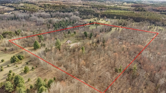 birds eye view of property with a rural view