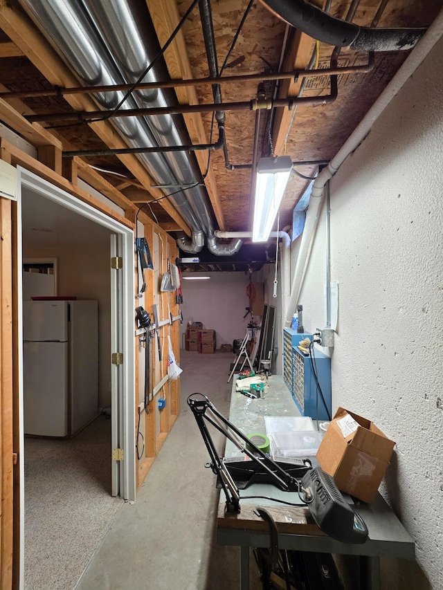 5795 Versailles Ave, Ann Arbor, MI 48103 - unfinished basement with freestanding refrigerator