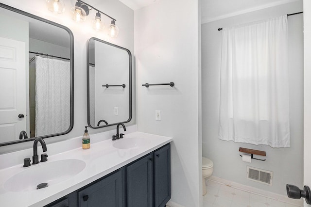 full bath featuring baseboards, visible vents, a sink, and toilet