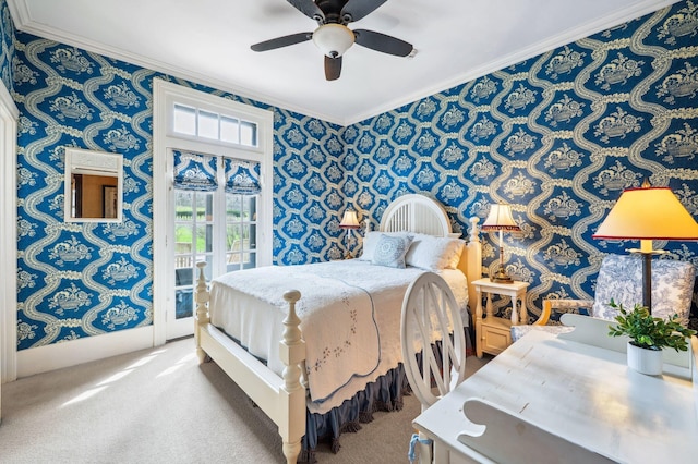 carpeted bedroom with crown molding, access to exterior, and wallpapered walls